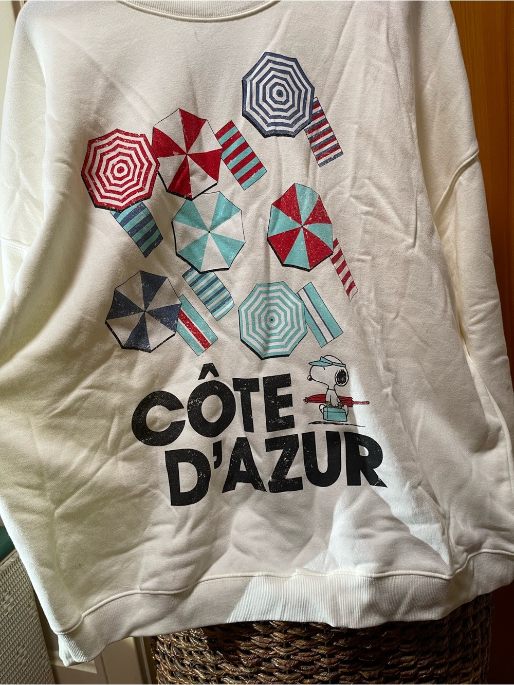 Peanuts White Crewneck Sweatshirt with Red and Aqua Umbrella Graphics